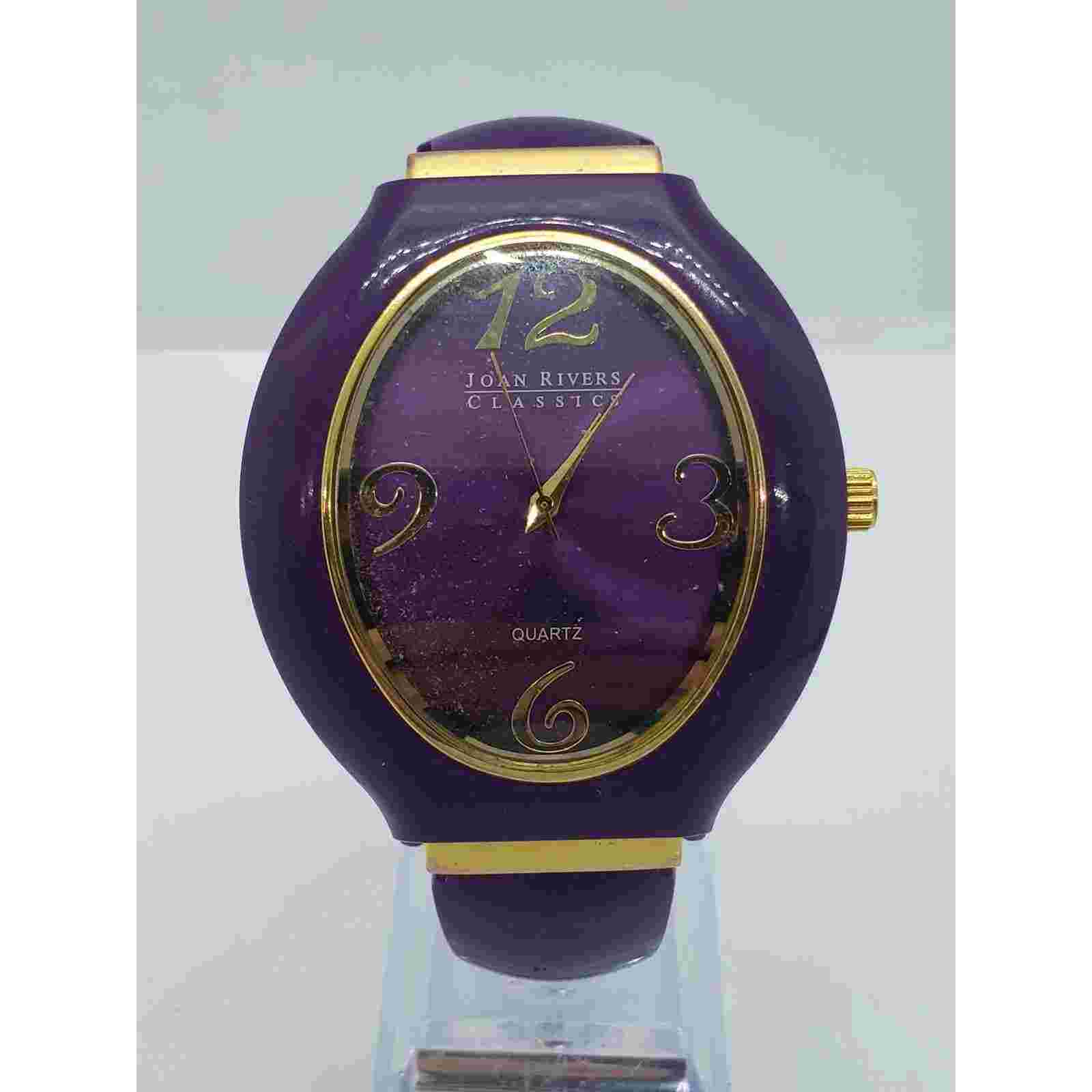 Joan Rivers Classics women's watch. Purple iridescent face, bangle band