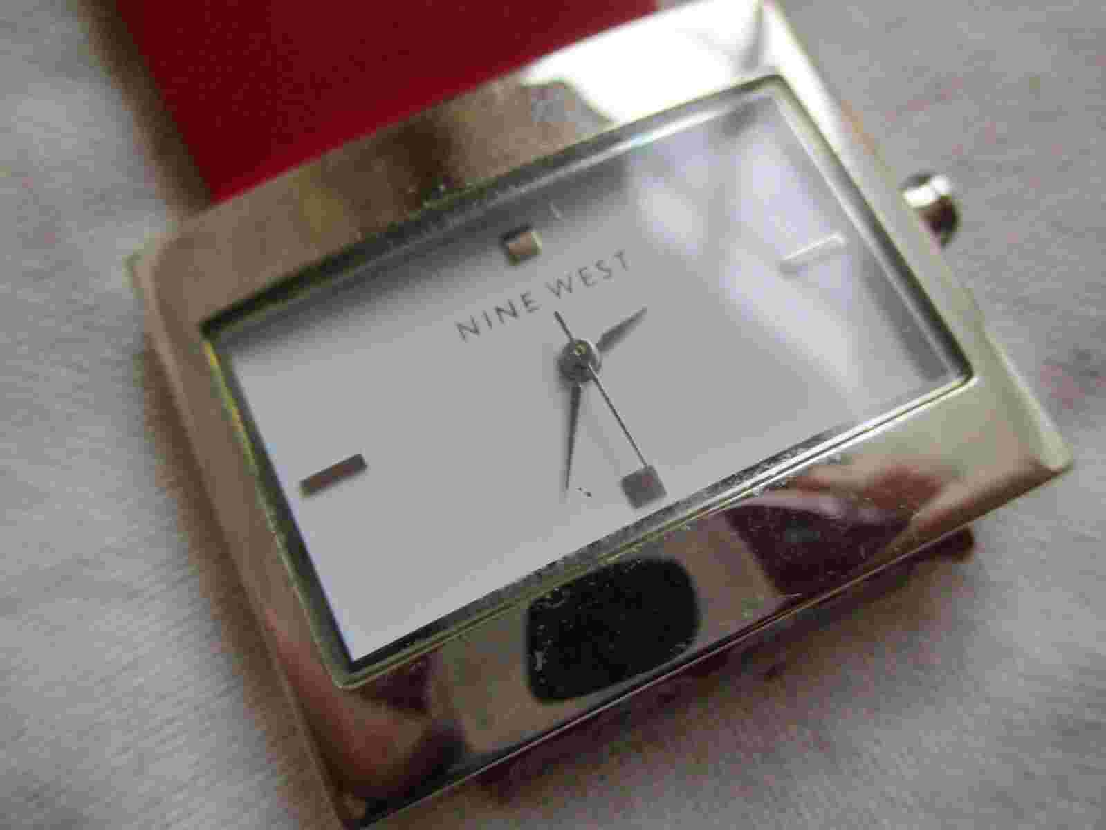 Nine West Wristwatch Silver Toned Red Buckle Band Rectangular White Face