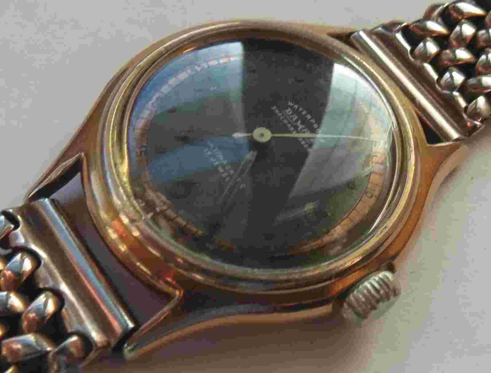 Damas mens wristwatch gold plated case screw cap load manual