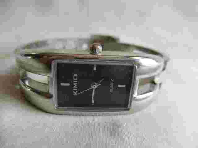 Kimio Analog Wristwatch with Water Resistance and Quartz Movement