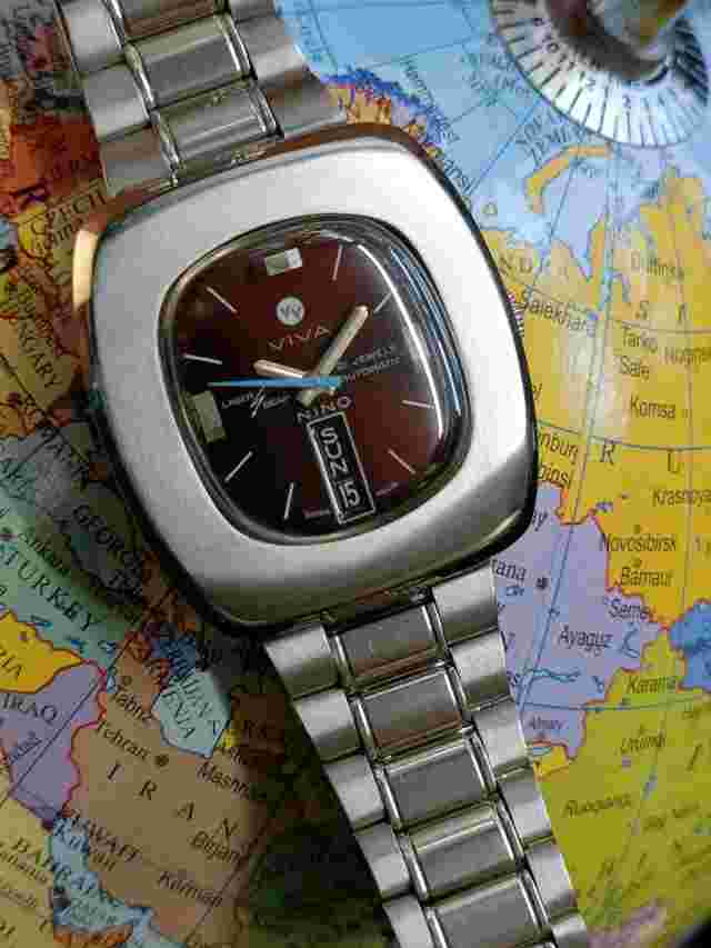 AUTHENTIC NINO VIVA LASER BEAM SWISS AUTOMATIC MENS MINT WINE DIAL VINTAGE WATCH