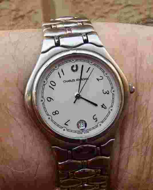 MANS VINTAGE CHARLES JOURDAN ST STEEL BRACELET WATCH. SWISS QUARTZ. VGC. GWO.