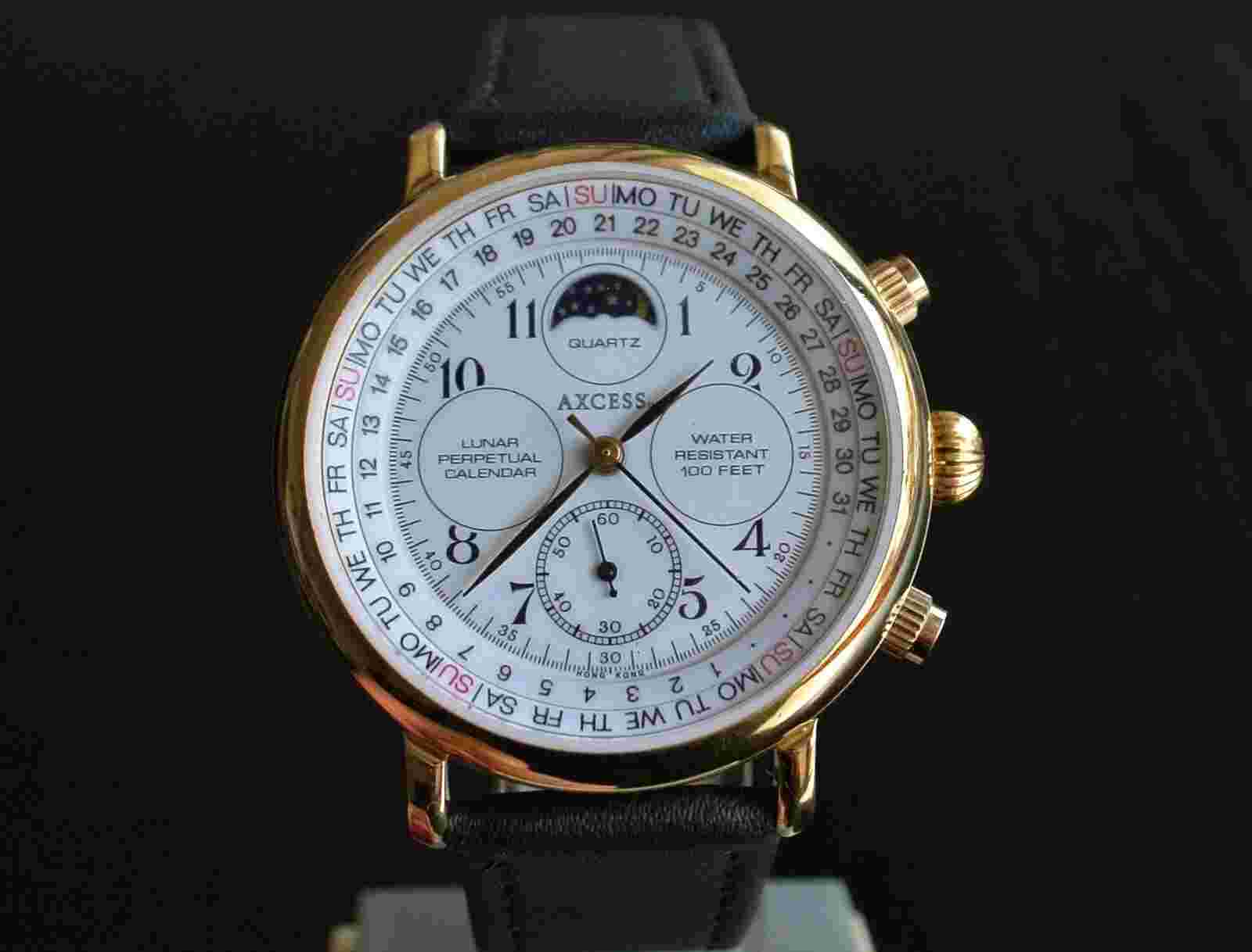 VINTAGE AXCESS SPORT CALENDAR MOON PHASE QUARTZ MEN'S GOLDEN BLACK DRESS WATCH