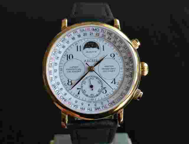 VINTAGE AXCESS SPORT CALENDAR MOON PHASE QUARTZ MEN'S GOLDEN BLACK DRESS WATCH