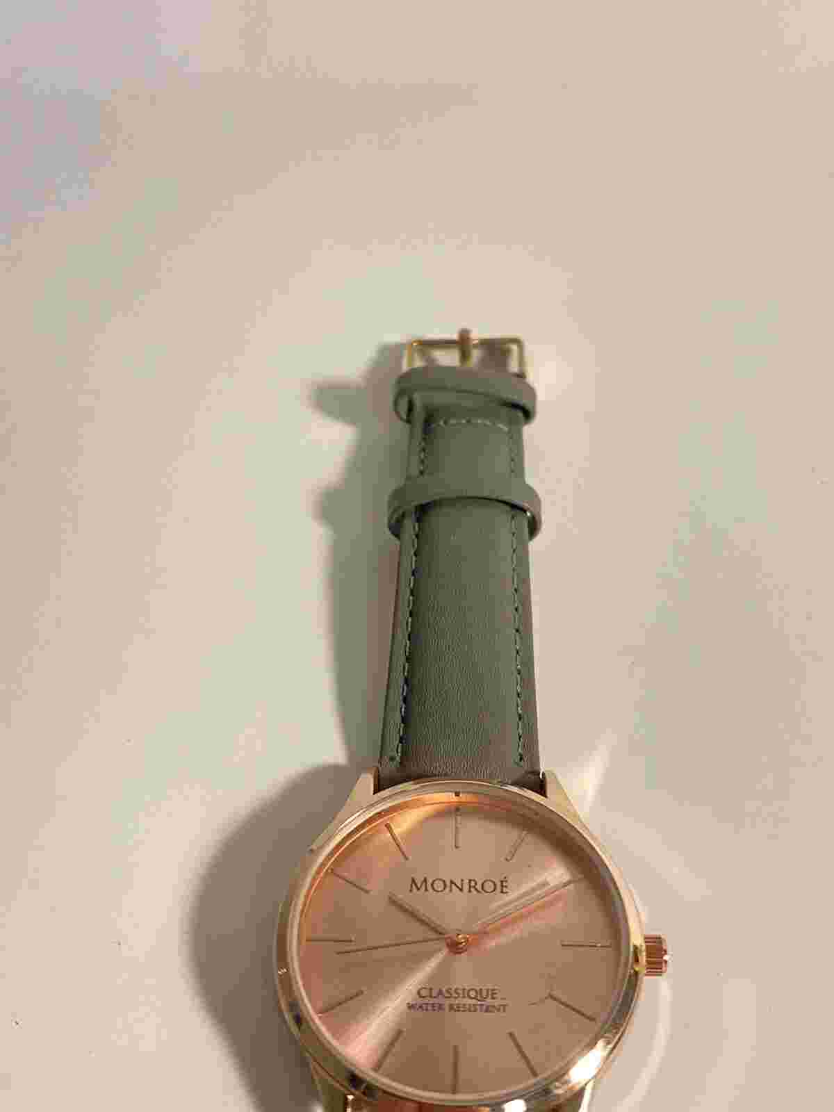 Monroe By Maestro Rose Gold Tone Dial Gray Leather Band Watch needs battery