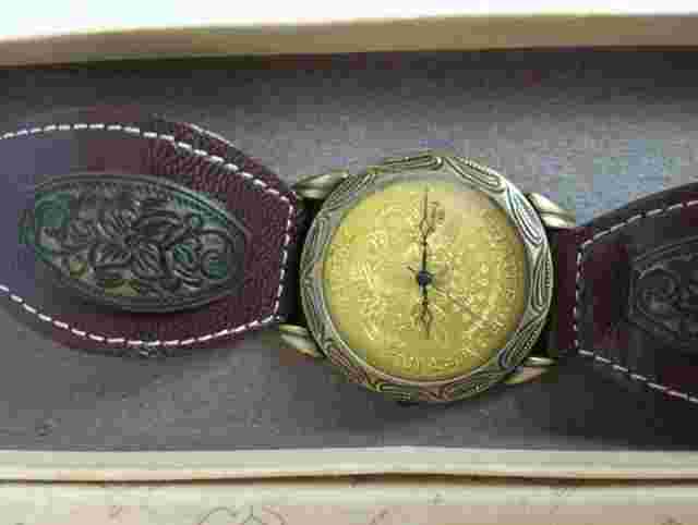 Vintage Triumph Twenty Coin Style Ornate Analog Quartz Watch