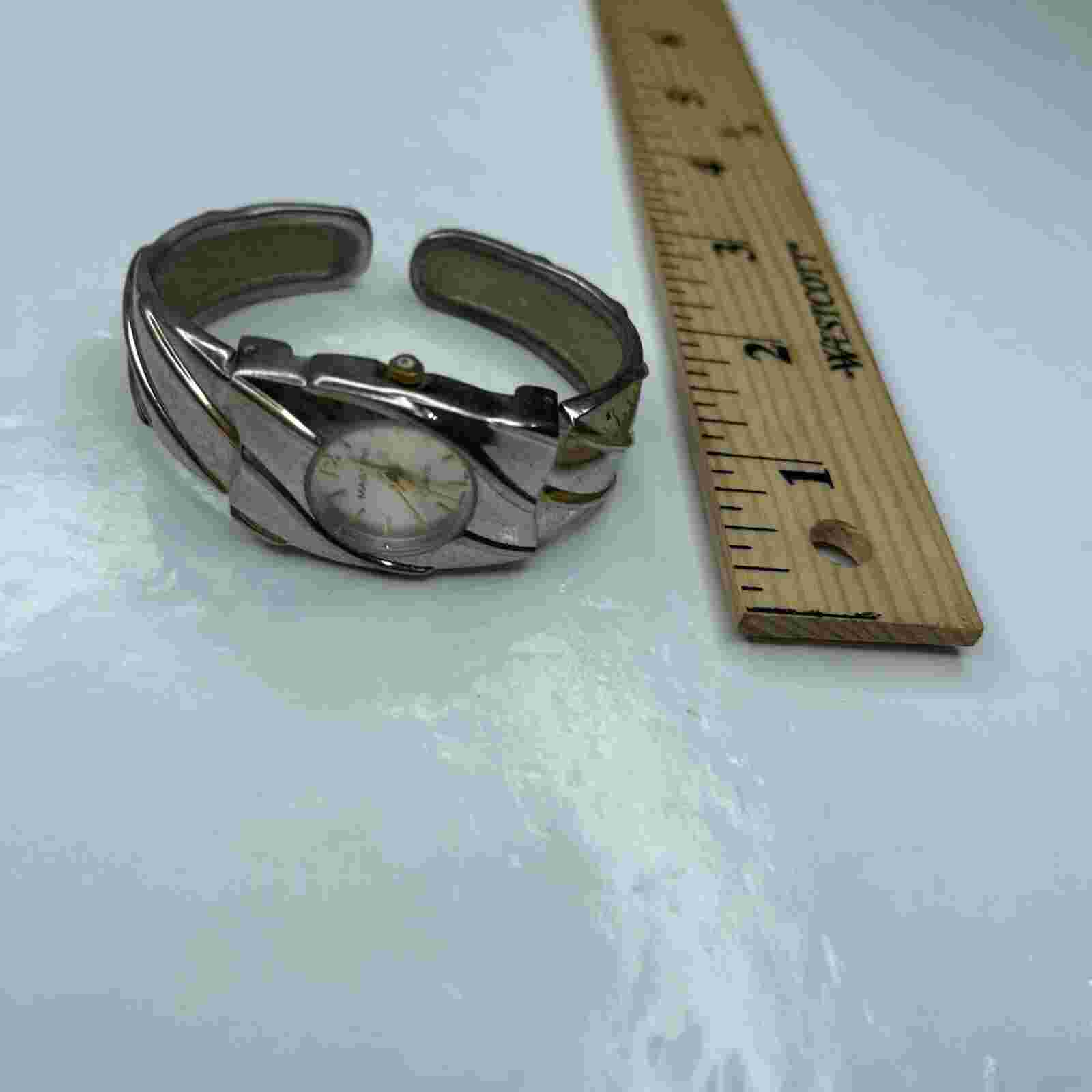A Massini MM1205 Accutime Japan Silver Cuff Retro Stainless Works
