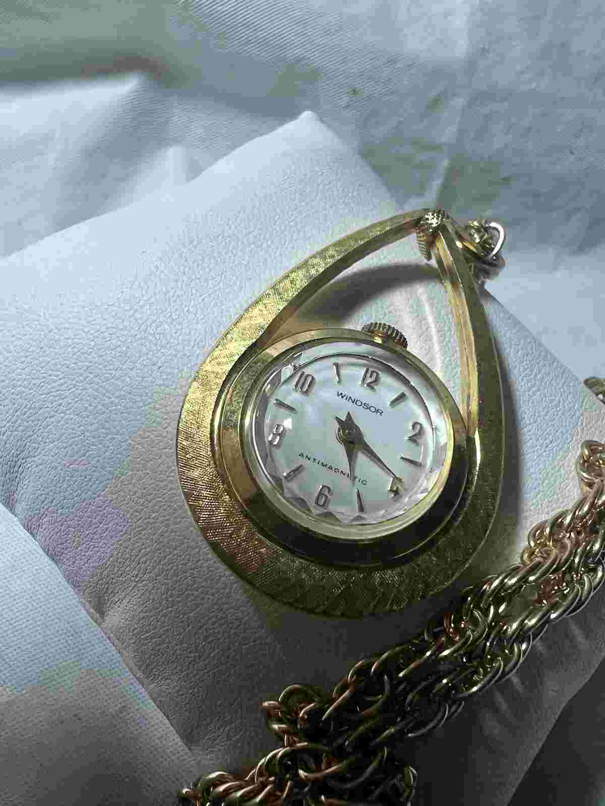 Windsor , antimagnetic, Swiss made ladies hanging watch come with the chain.