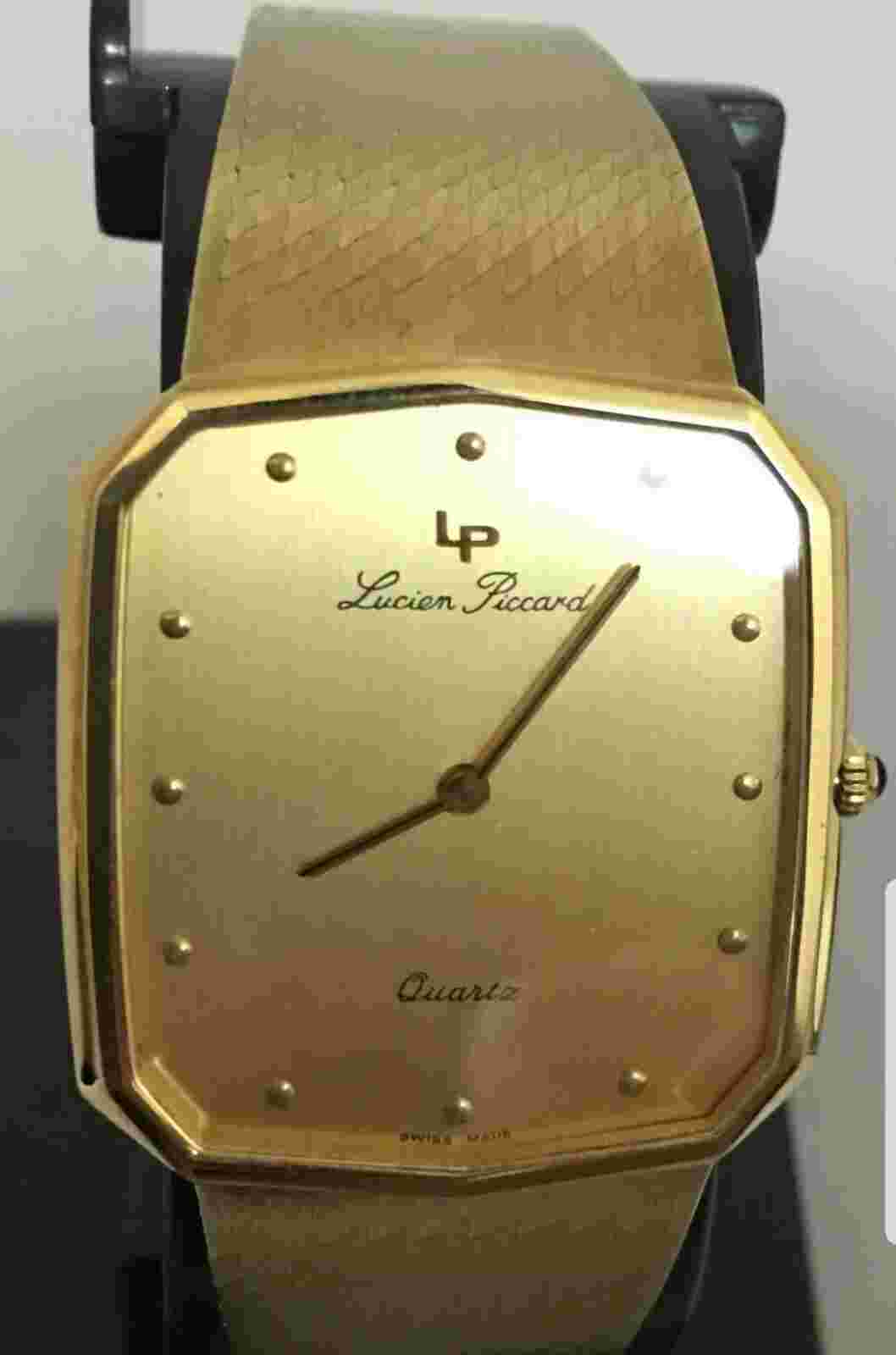 authentic  Excellent Unisex Lucien Piccard 14K solid yellow gold quartz watch