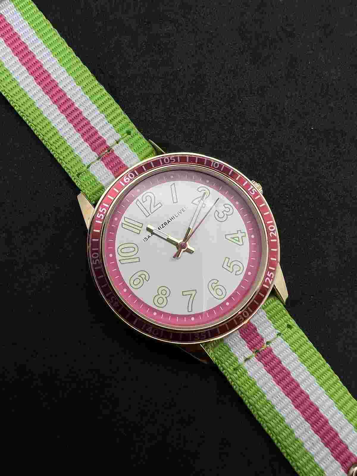 ISSAC MIZRAHI LIVE Women’s 38mm Quartz Watch SS Case Pink Bezel  Nylon Strap NOS