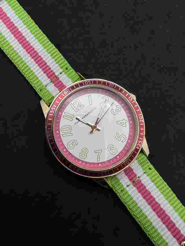 ISSAC MIZRAHI LIVE Women’s 38mm Quartz Watch SS Case Pink Bezel  Nylon Strap NOS