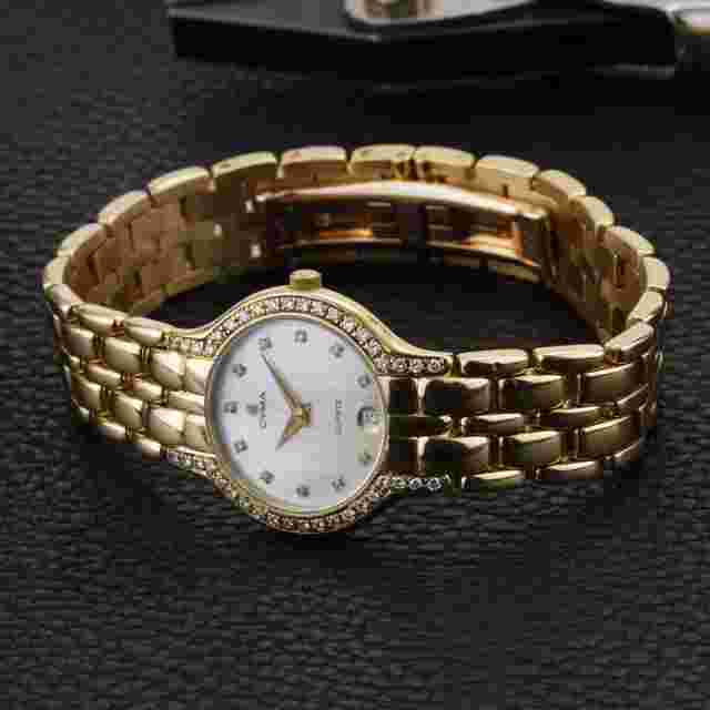 Ladies Cyma 18K Yellow Gold Diamond Bezel Circa 2002 in Excellent Condition