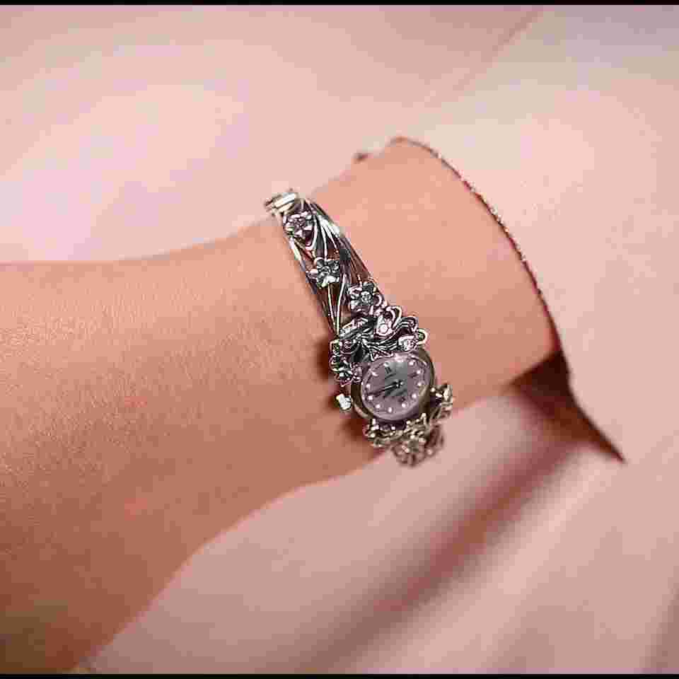 Elegant silver mechanical 17 jewels watch CHAIKA with precious stones.