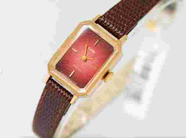 New old stock women watch red dial rectangular gold plated tank style leather