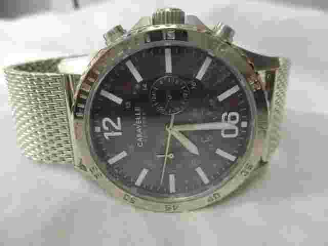 Caravelle New York Watch Silver Toned Stainless Steel Band Round Black Face