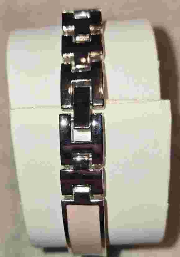 Ladies watch with pink strap, crystals around fac, original box, never worn