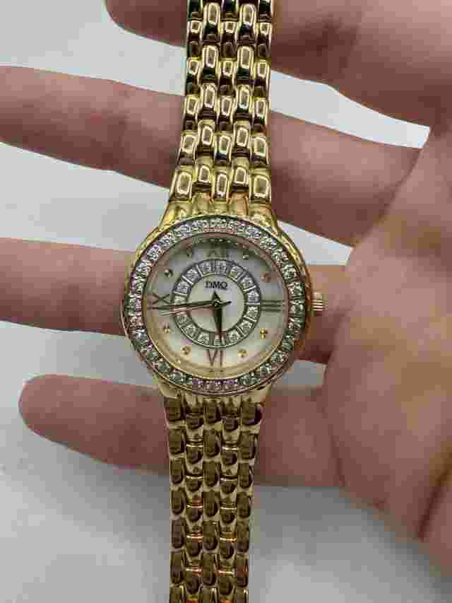 DMQ Gold Tone Cubic Zirconia Crested Ladies Watch