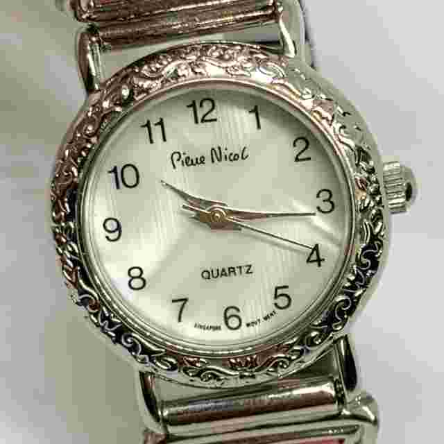 Pierre Nicol women’s wrist watch 23mm case silver tone pearl dial SZ 6” running