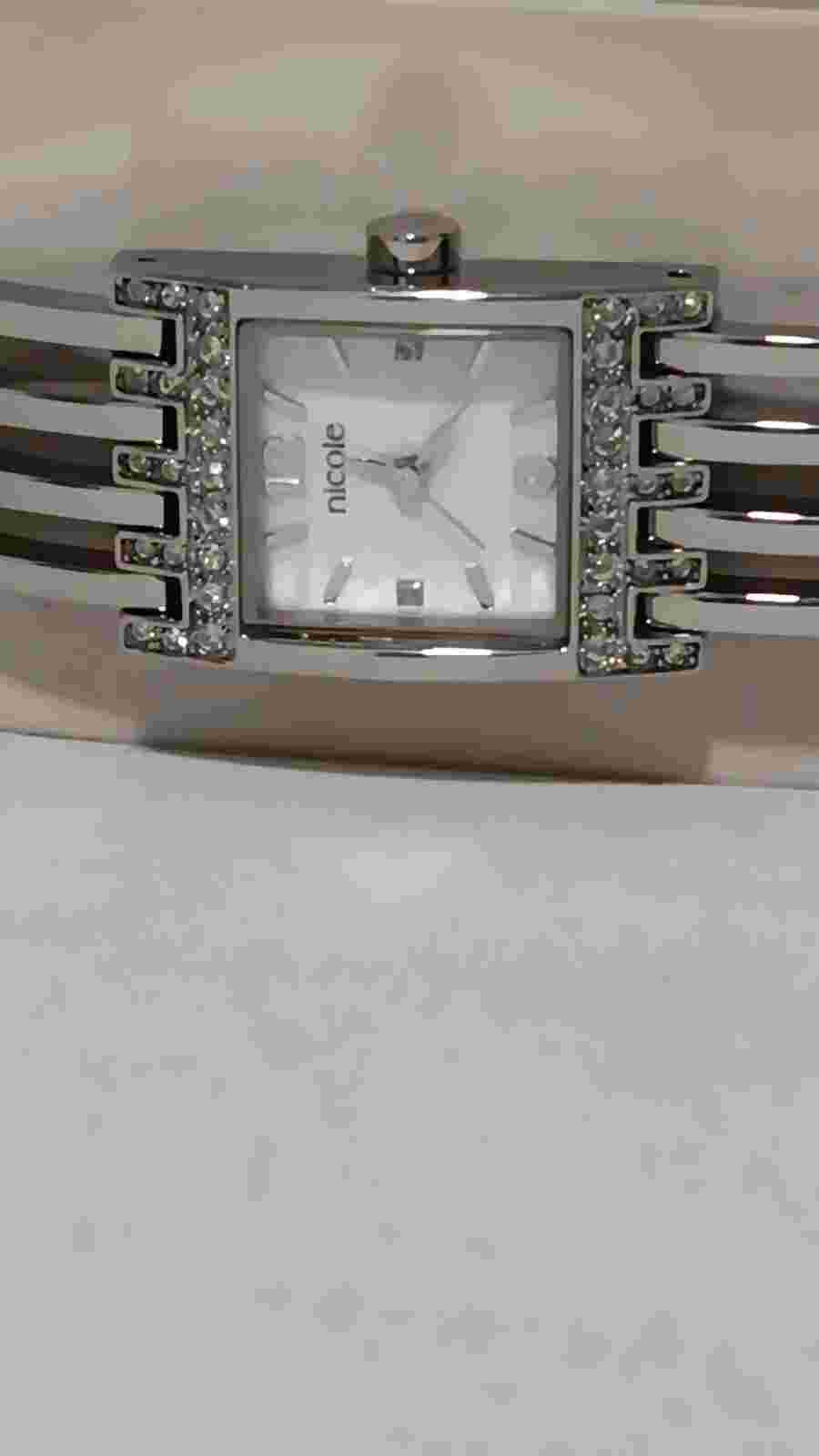 NICOLE LADIES CHROME  WRIST WATCH,WITH GEM STONE.