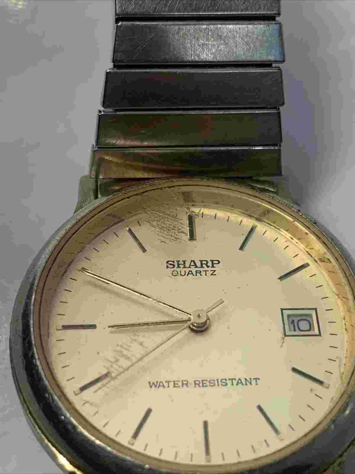 Sharp quartz water resistant wrist watch ￼ Scratch On Glass ￼ Japan Movement