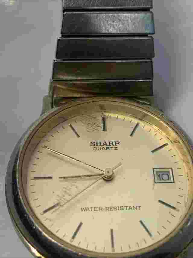Sharp quartz water resistant wrist watch ￼ Scratch On Glass ￼ Japan Movement