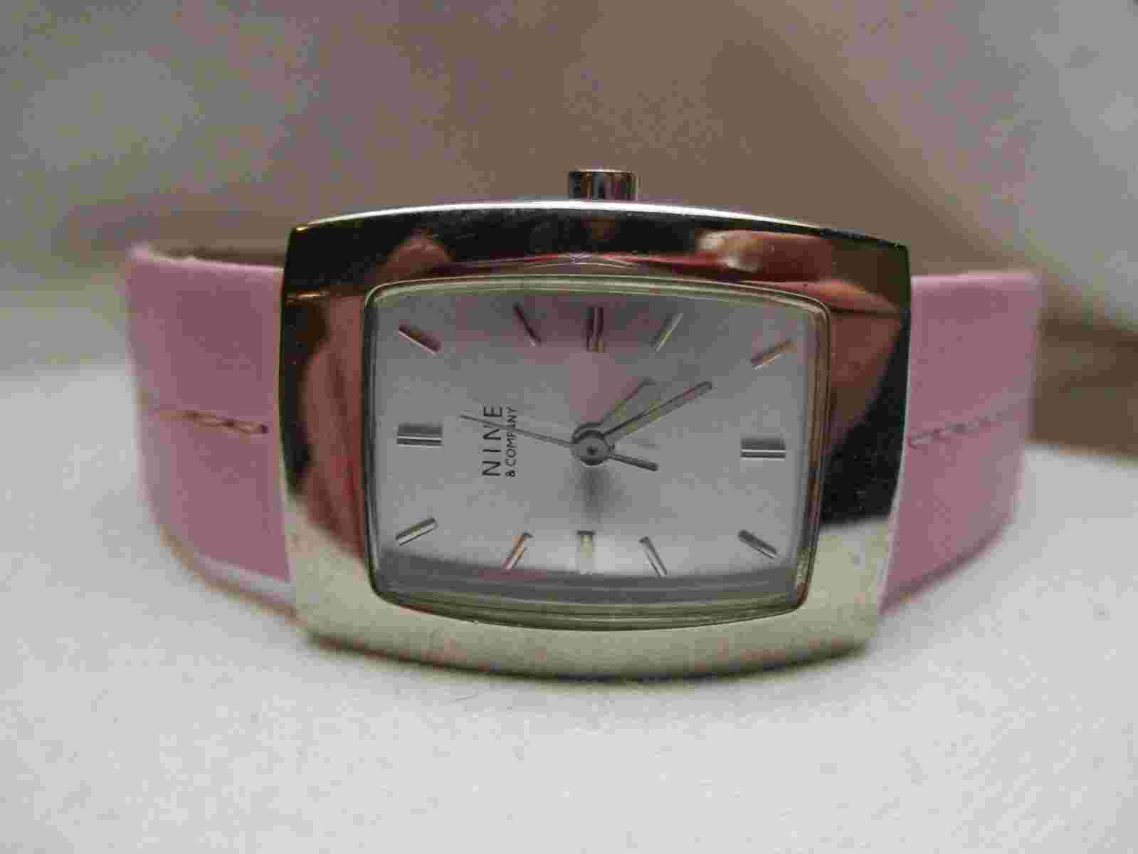 Nine & Company Analog Wristwatch with a Buckle Band