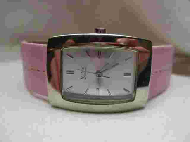 Nine & Company Analog Wristwatch with a Buckle Band