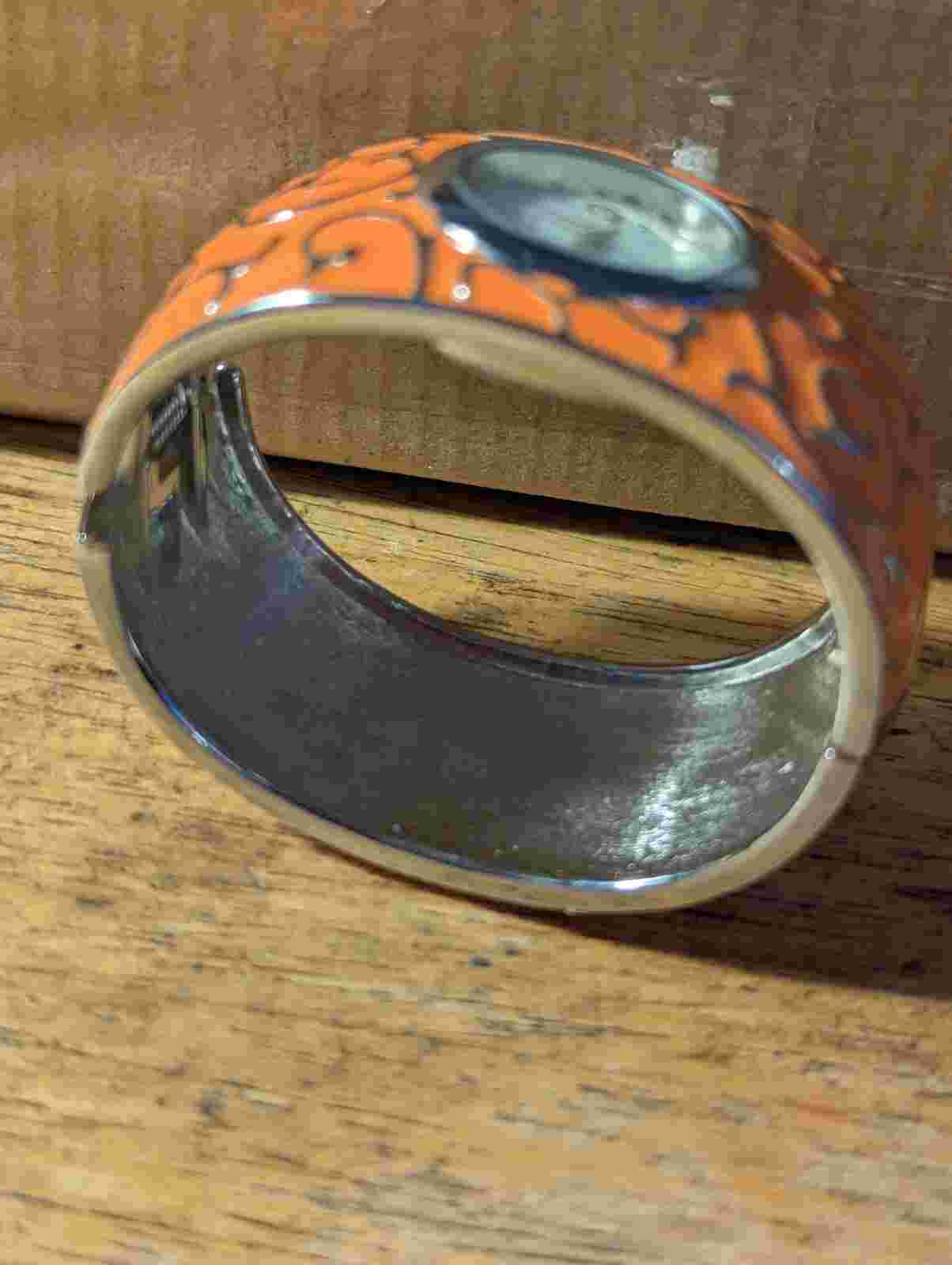 Narmi 70s Style Embossed Bangle Watch Orange