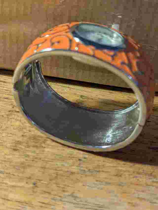 Narmi 70s Style Embossed Bangle Watch Orange