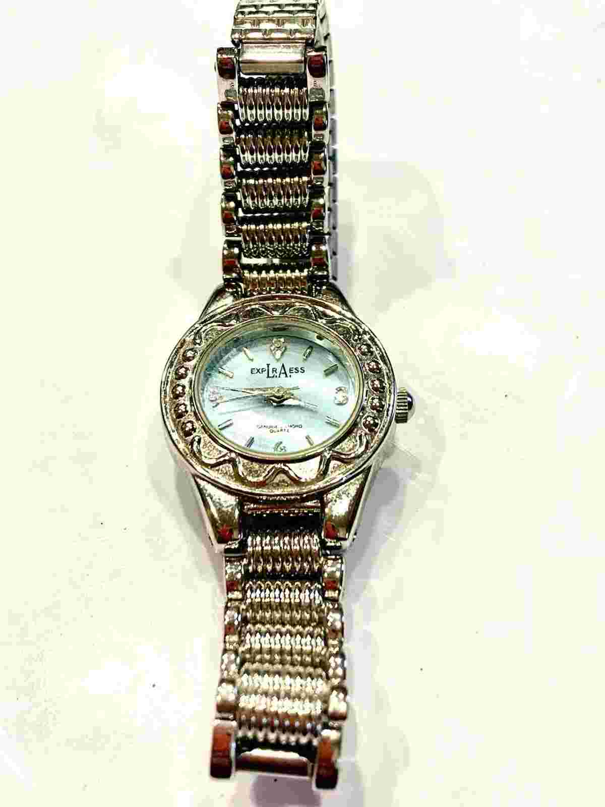 Estate LA Express Genuine Diamond Quartz Silver Tone Wristwatch