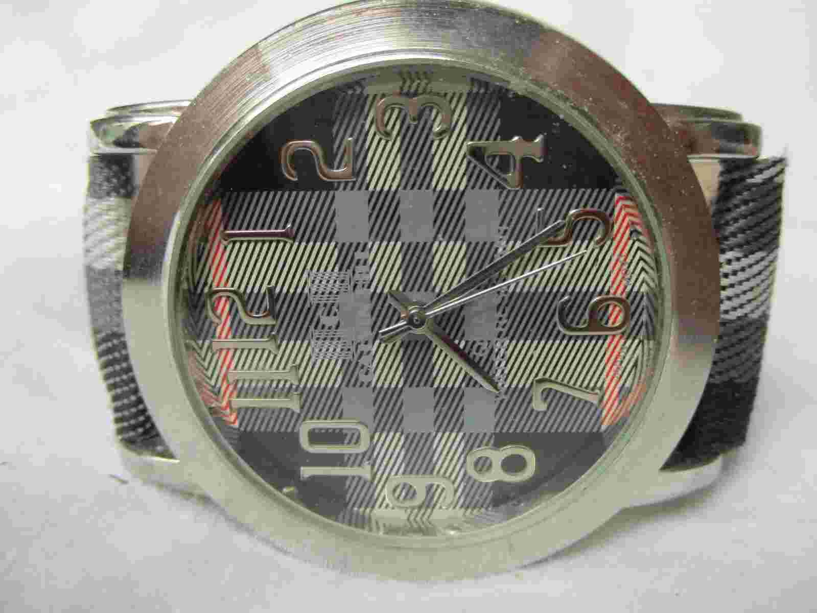 Calvin Hill Watch Round Face Buckle Gray Plaid Band Silver Toned