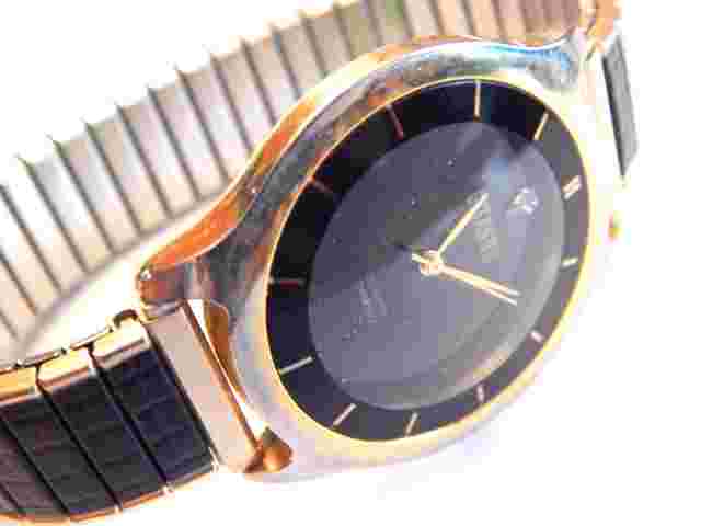 Vintage Women's Gitano Glack and Gold Wrist Watch Quartz Mov't Stainless Back