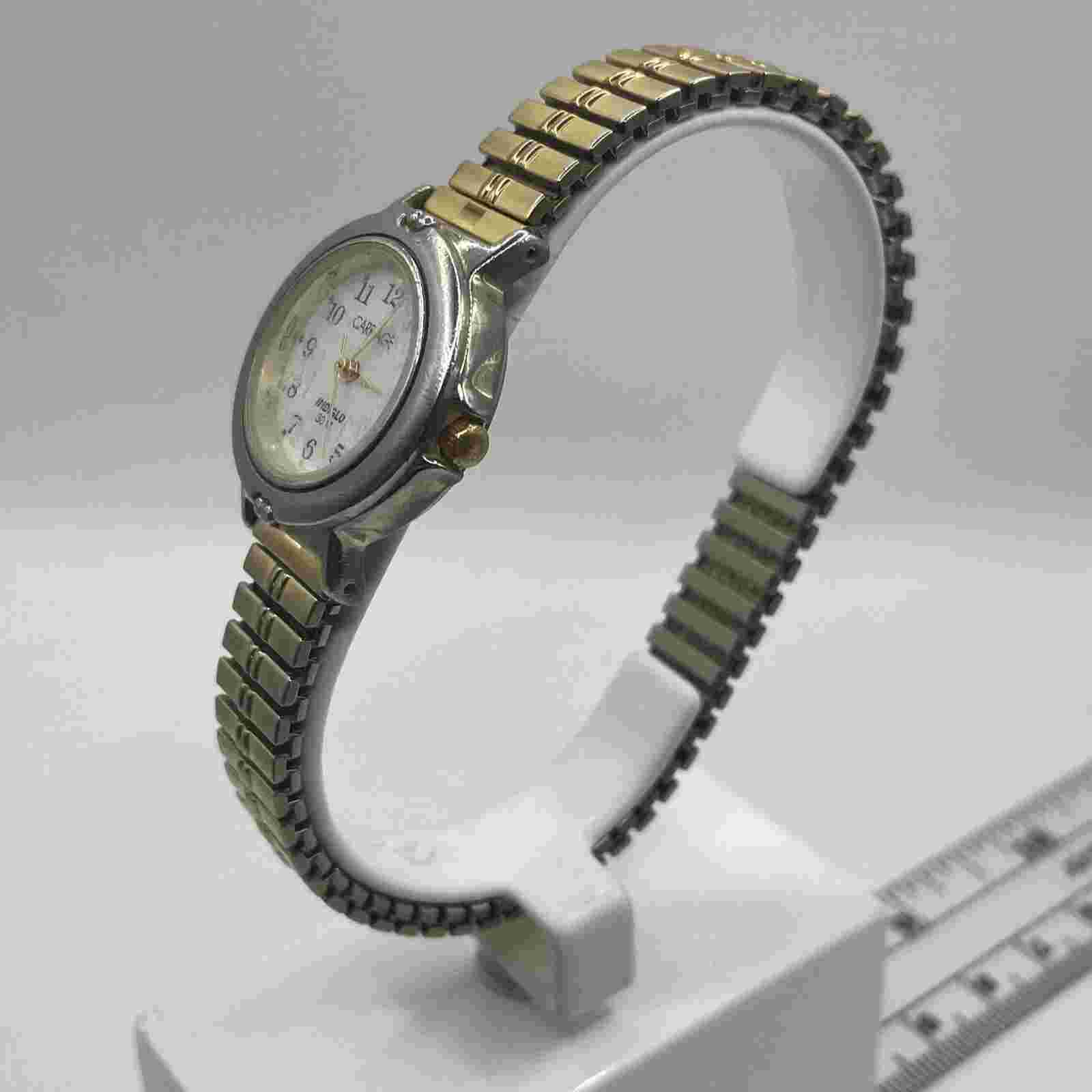 Carriage Indiglo ladies watch,stretch band,gold/silver tone .