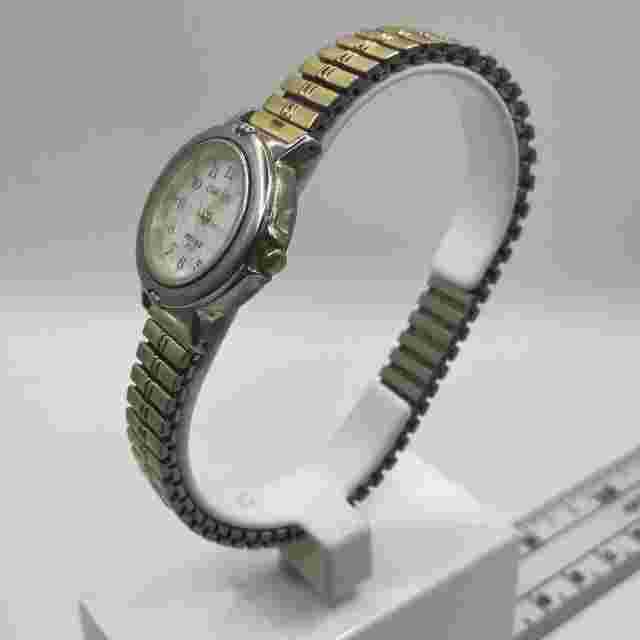 Carriage Indiglo ladies watch,stretch band,gold/silver tone .
