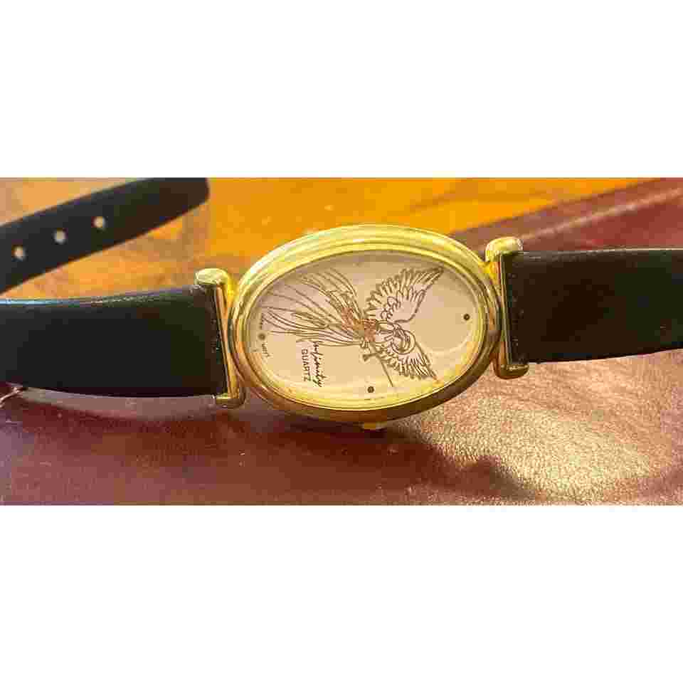 VTG Women's 25mm Gold Tone Infinity Watch, Trumpet Blowing Angel On Face