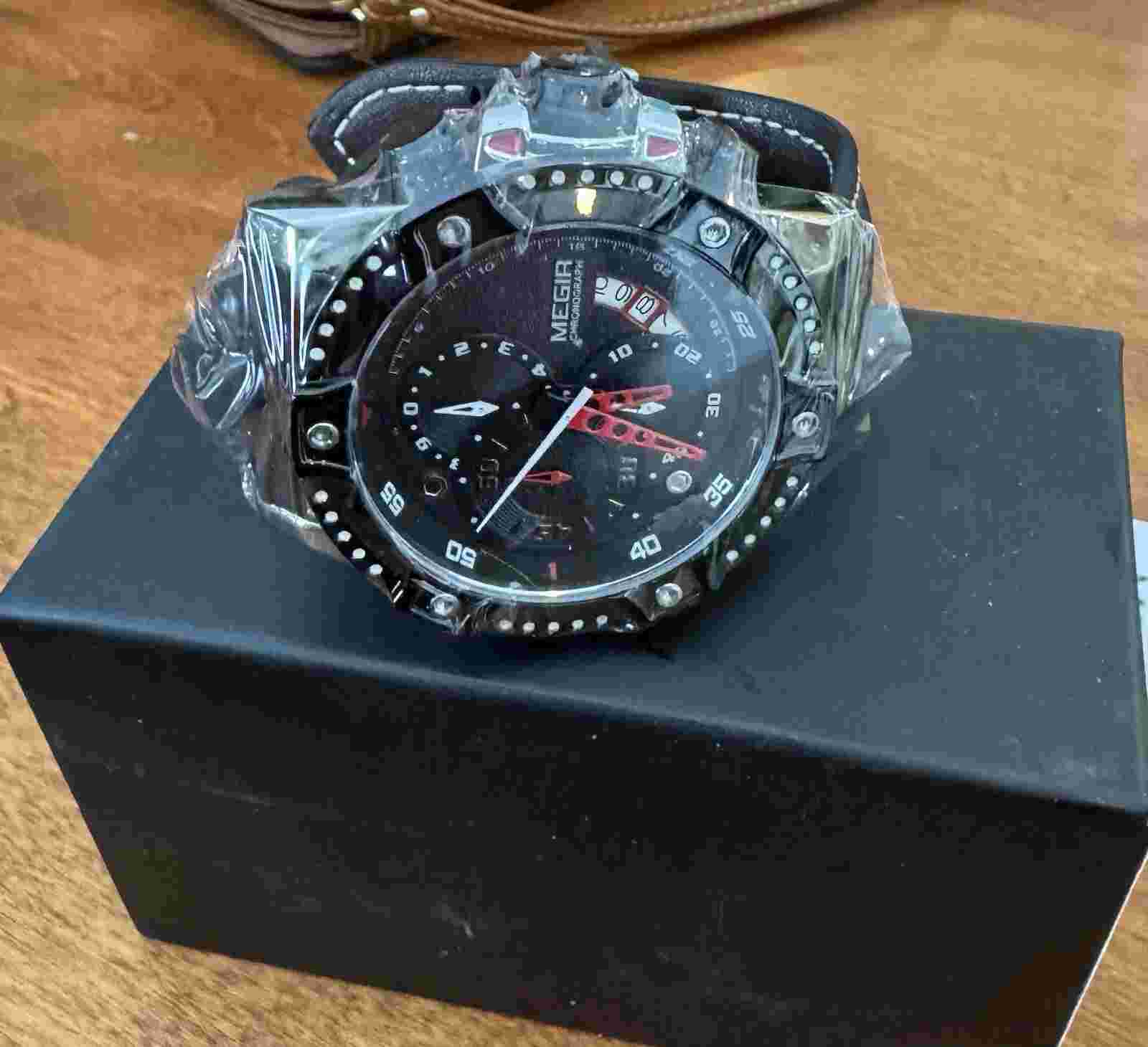 MEGIR MAN WATCH.  Very Nice And Well Made Leather And Silver Band.
