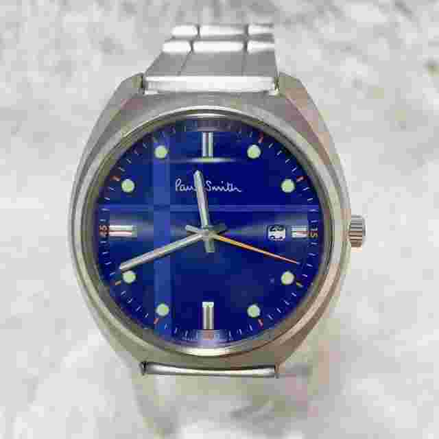 PAUL SMITH CLOSED EYES SOLAR TECH MEN'S WRISTWATCH ROUND FACE DIAL COLOR: BLUE