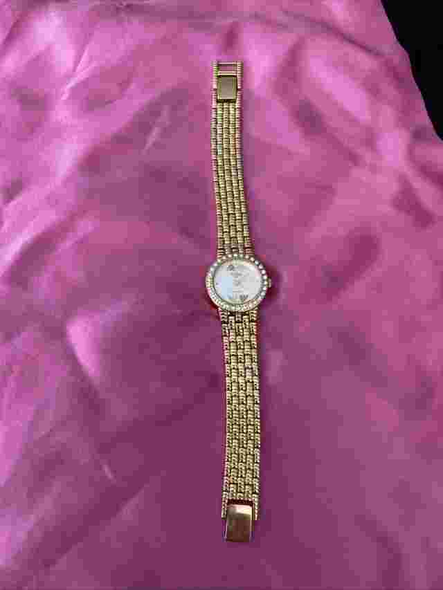 Black Hills Gold, gold-tone watch.