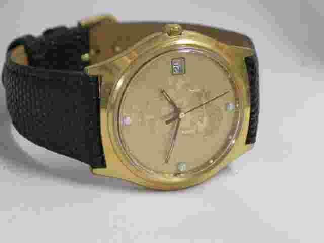 Jostens Men's Gold Tone Watch With Date