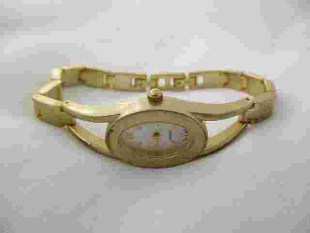 Advance Goldtone Watch, Oval Mother of Pearl Dial, Metal Link Bracelet Band