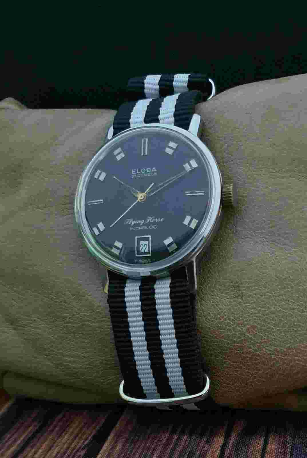 ELOGA FLYING HORSE FHF 73-4N VINTAGE 60's RARE 21J SWISS WATCH.