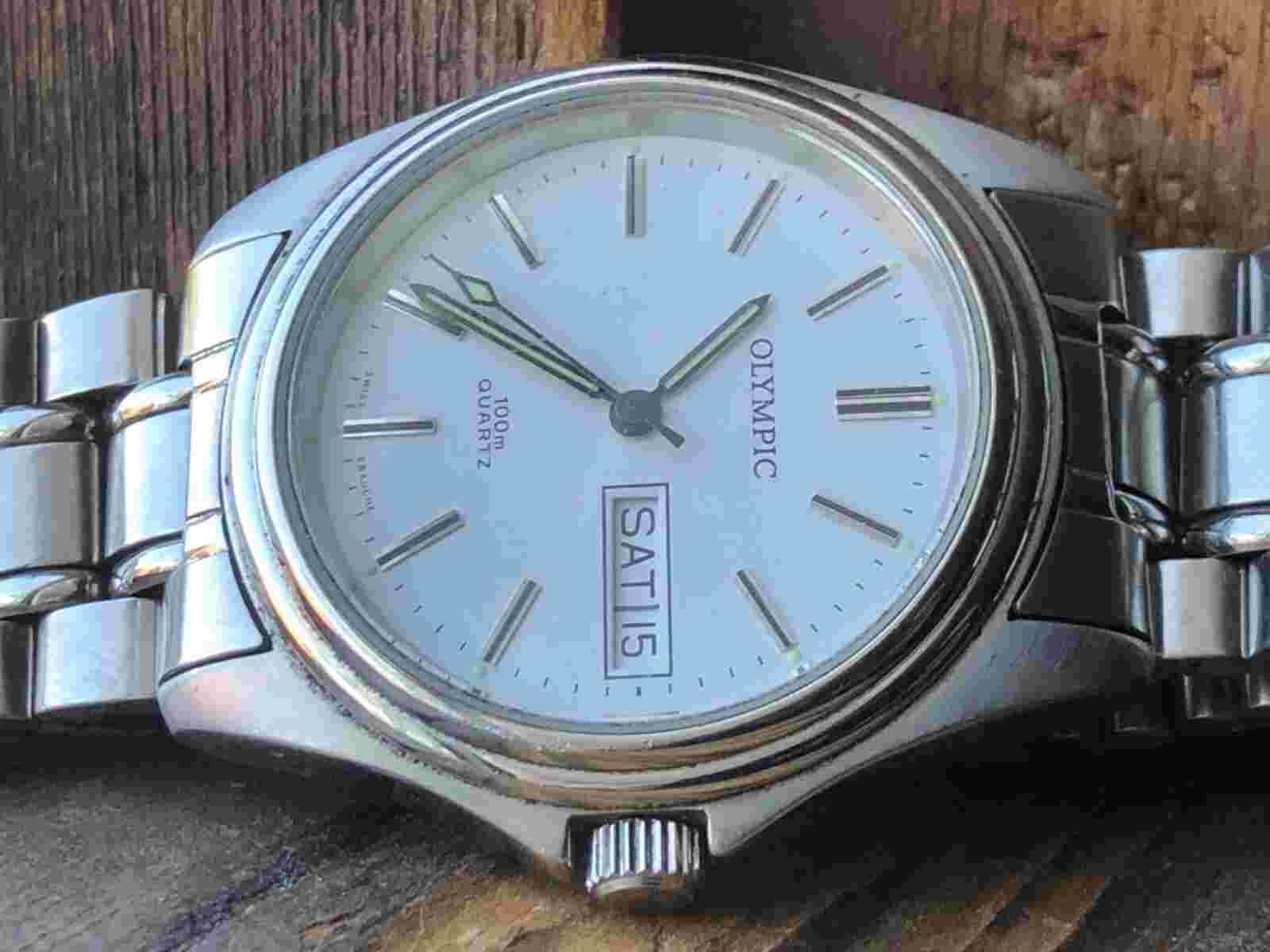 AUTHENTIC Nice Vintage Gents OLYMPIC QUARTZ ETA.955.124,SWISS,7j,Day/Date Watch