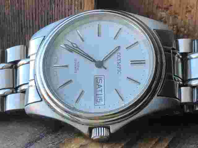 AUTHENTIC Nice Vintage Gents OLYMPIC QUARTZ ETA.955.124,SWISS,7j,Day/Date Watch