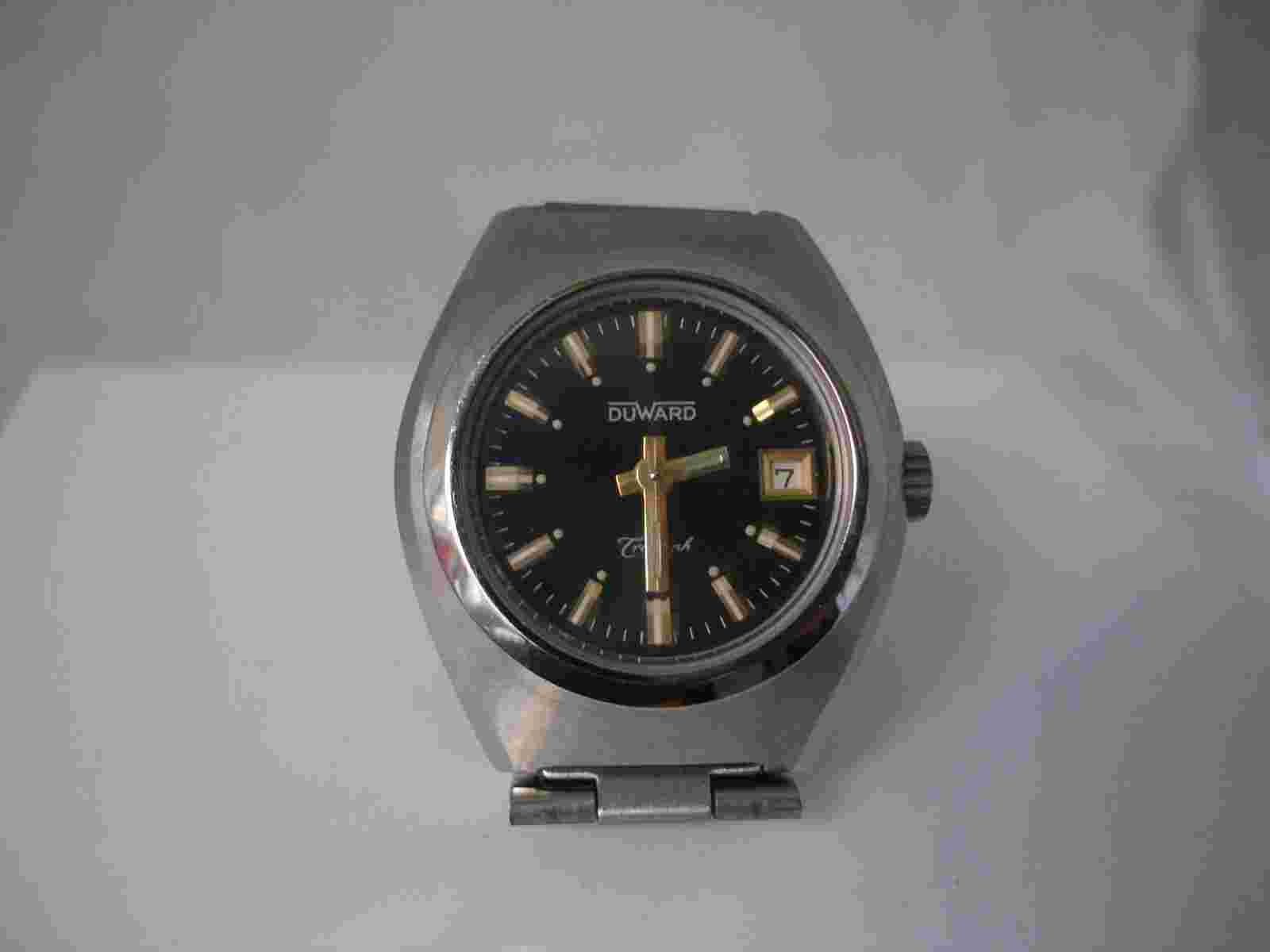 Duward Triumph. Stainless Steel. Black dial. Armis. Date. Rope. 1970 Women