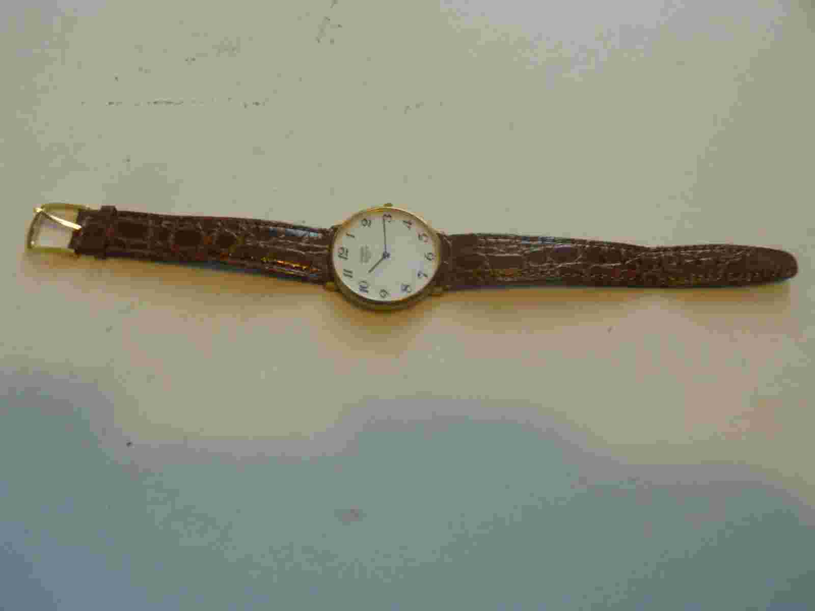 Vintage Emerich Meerson women's Brown leather band & Analog used wristwatch.