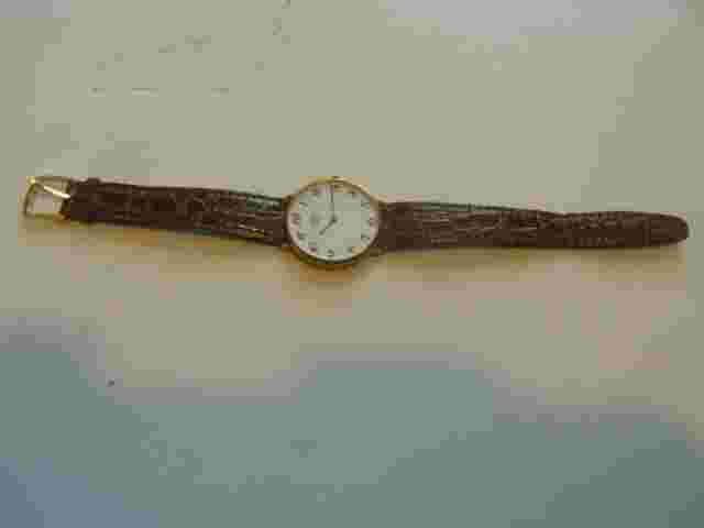 Vintage Emerich Meerson women's Brown leather band & Analog used wristwatch.