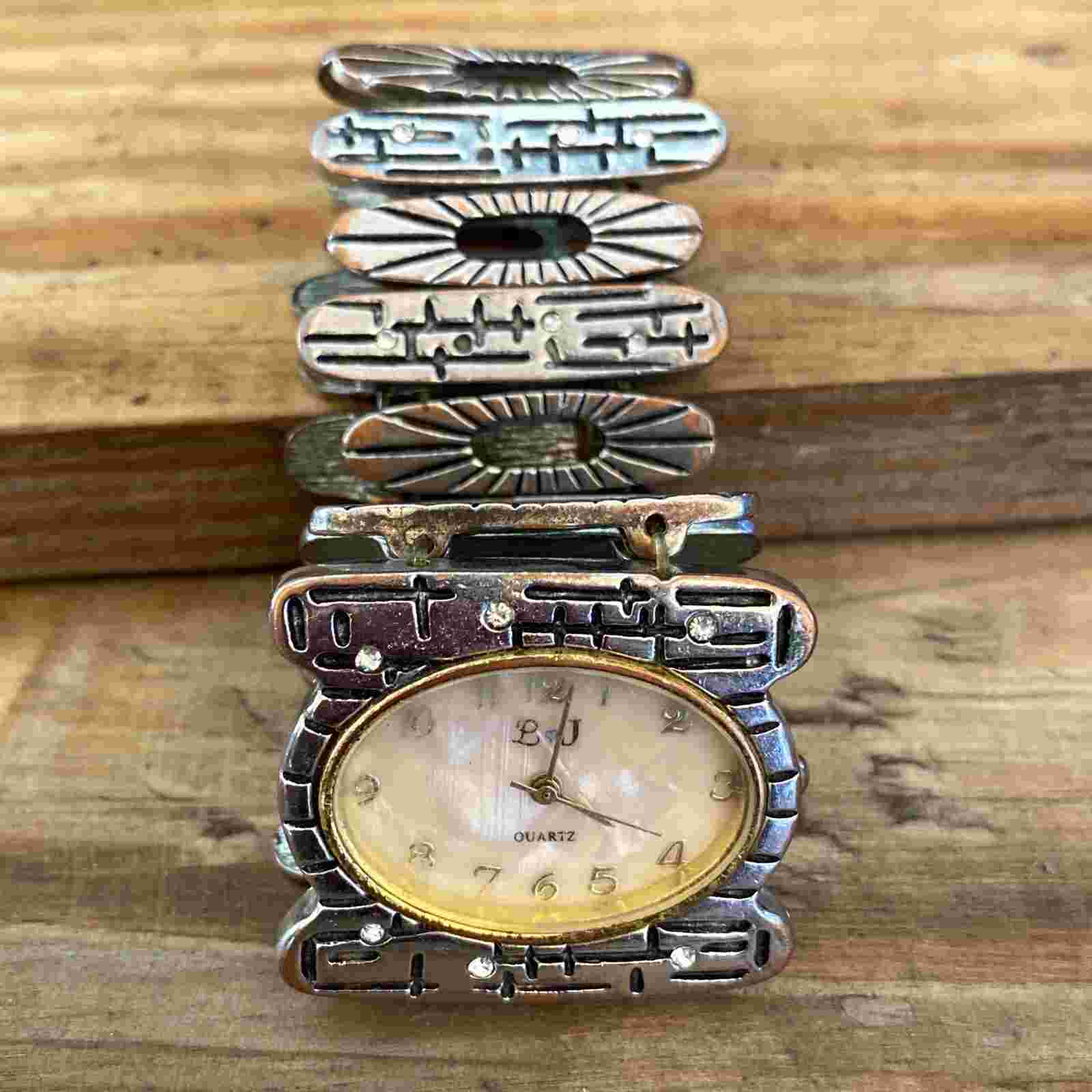 L & J Quartz Silver Tone Heart Cross Elastic Cuff Watch Stainless Steel Back