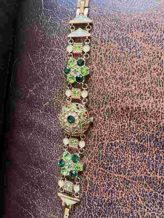 Colleen Lopes green rhinestone bracelet watch 7-1/2”. Plastic Still On Watch Z-5