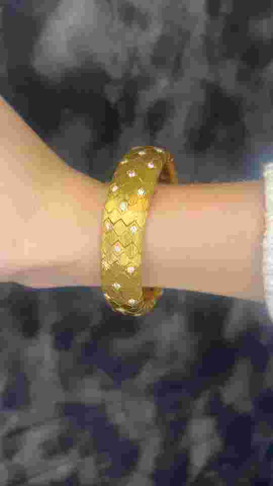 1950s Tiffany & Co. 18K Gold and Diamond “Peek A Boo” Hidden Watch Bracelet