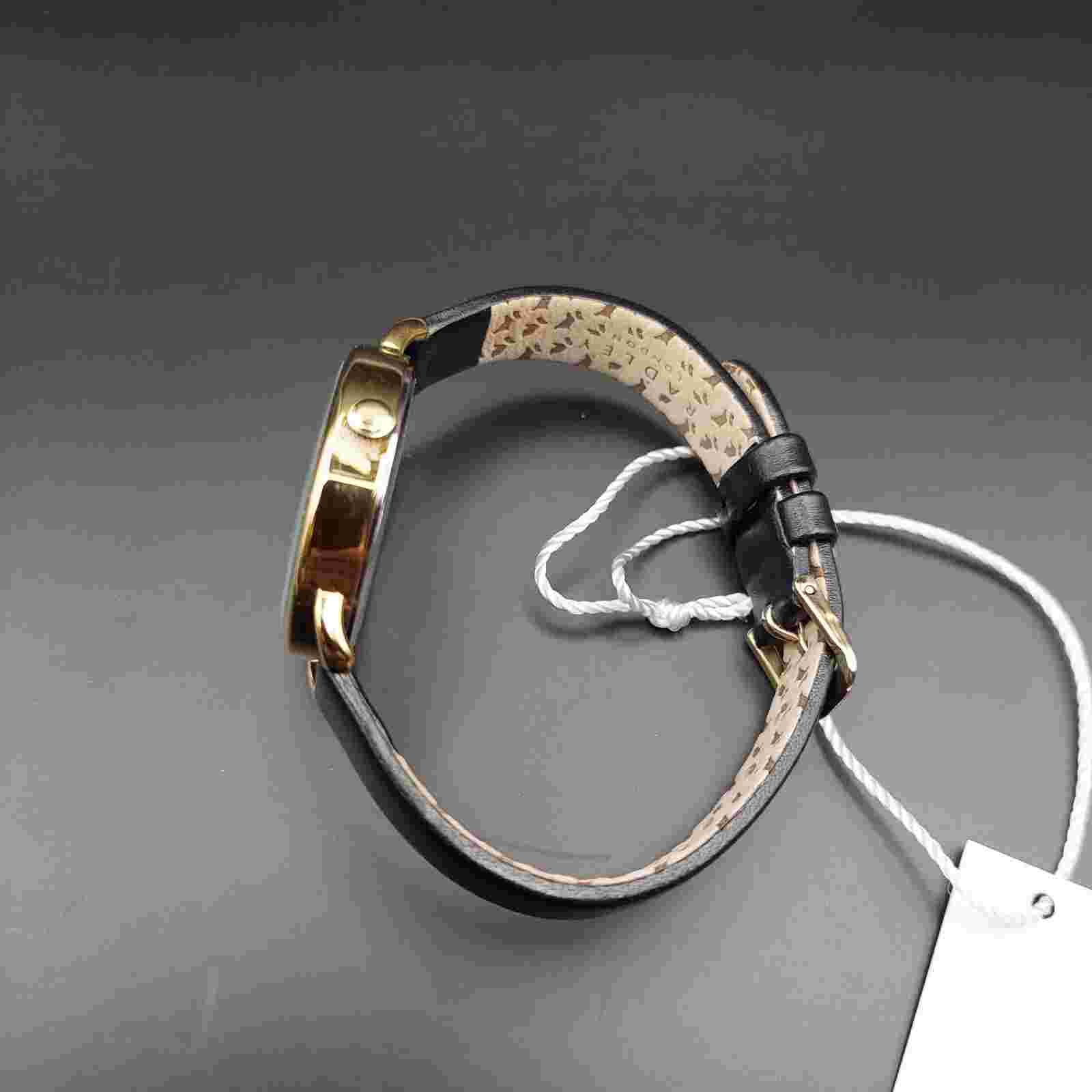 Radley watch with green stone bracelet